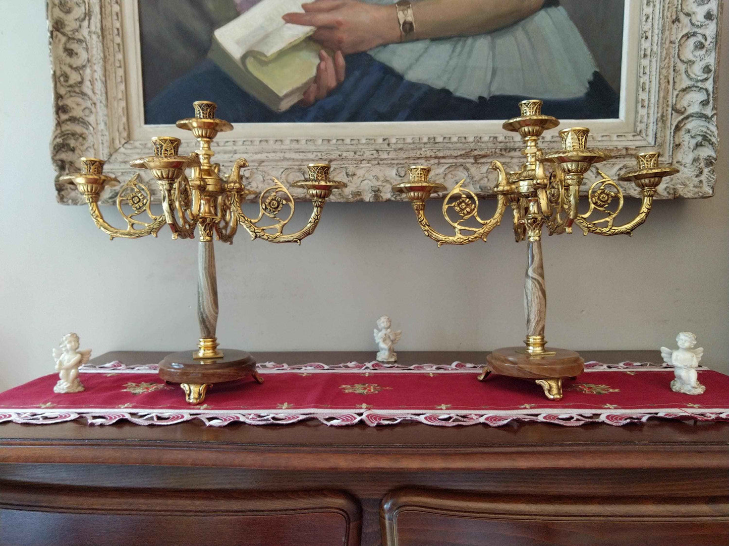 Paire de candélabres en bronze doré et onyx, style Restauration avec décor de tête d'aigle