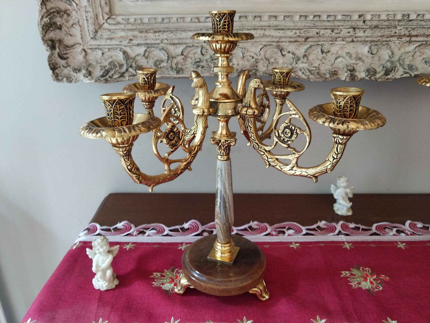 Paire de candélabres en bronze doré et onyx, style Restauration avec décor de tête d'aigle