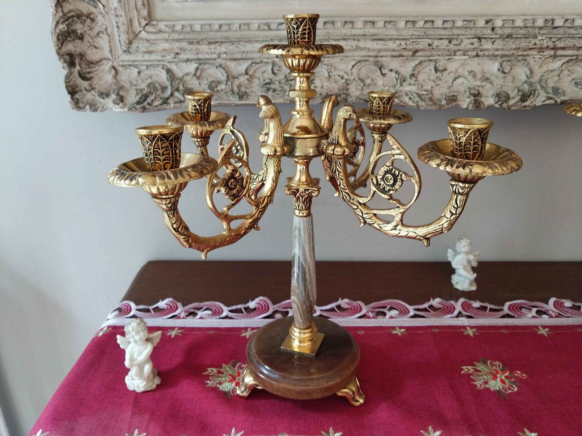 Paire de candélabres en bronze doré et onyx, style Restauration avec décor de tête d'aigle