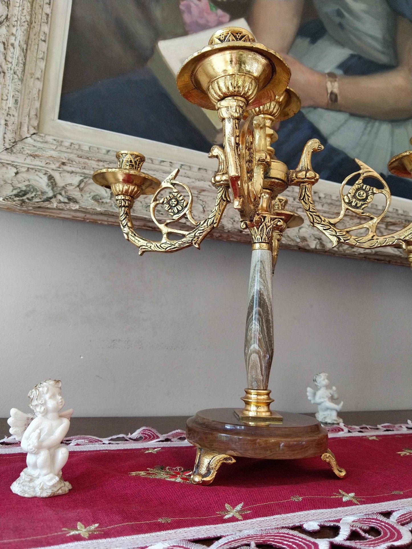 Paire de candélabres en bronze doré et onyx, style Restauration avec décor de tête d'aigle
